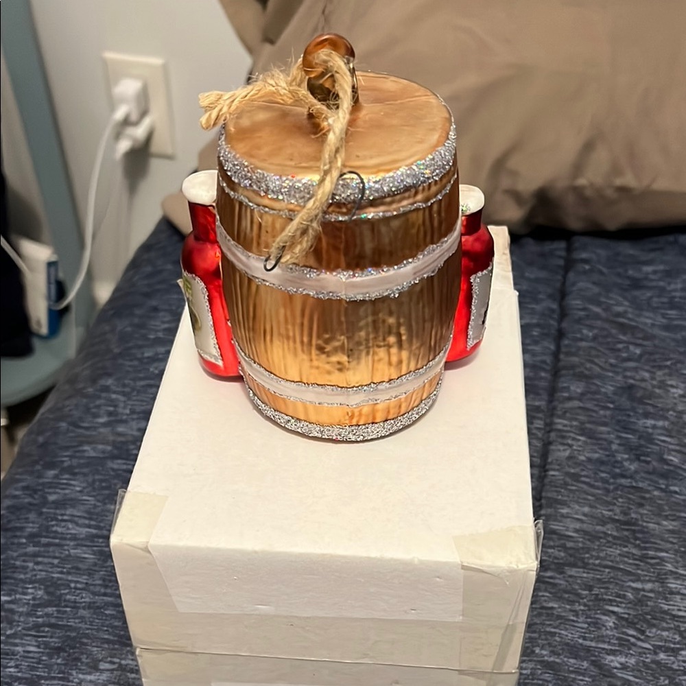 Festive Barrel Ornament with Red Accents